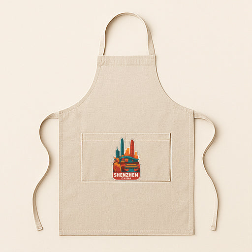A beige apricot with a graphic design on the front pocket, featuring a city skyline.