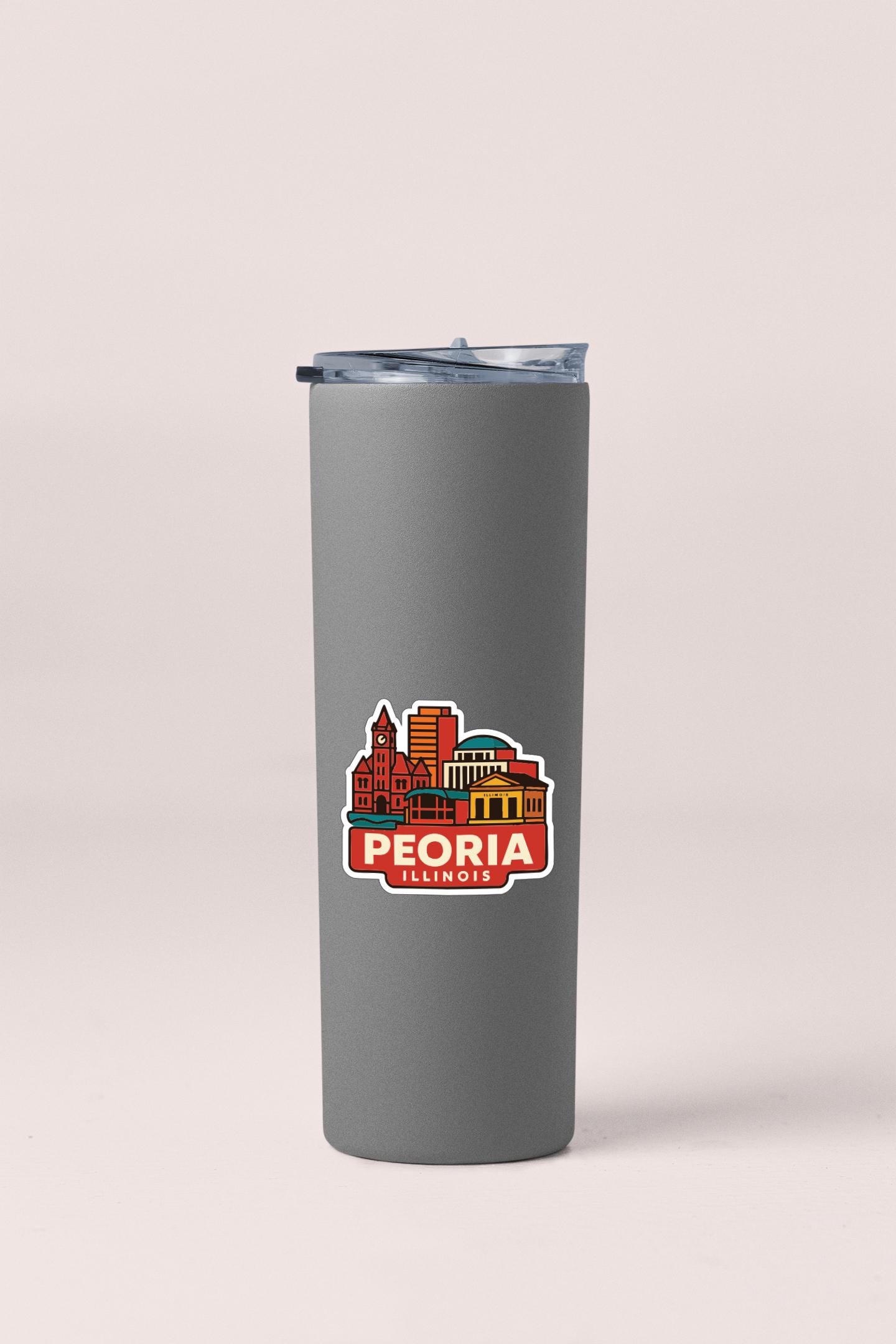 A gray insulated tumbler with a printed design of the city of Peoria, Illinois on it.