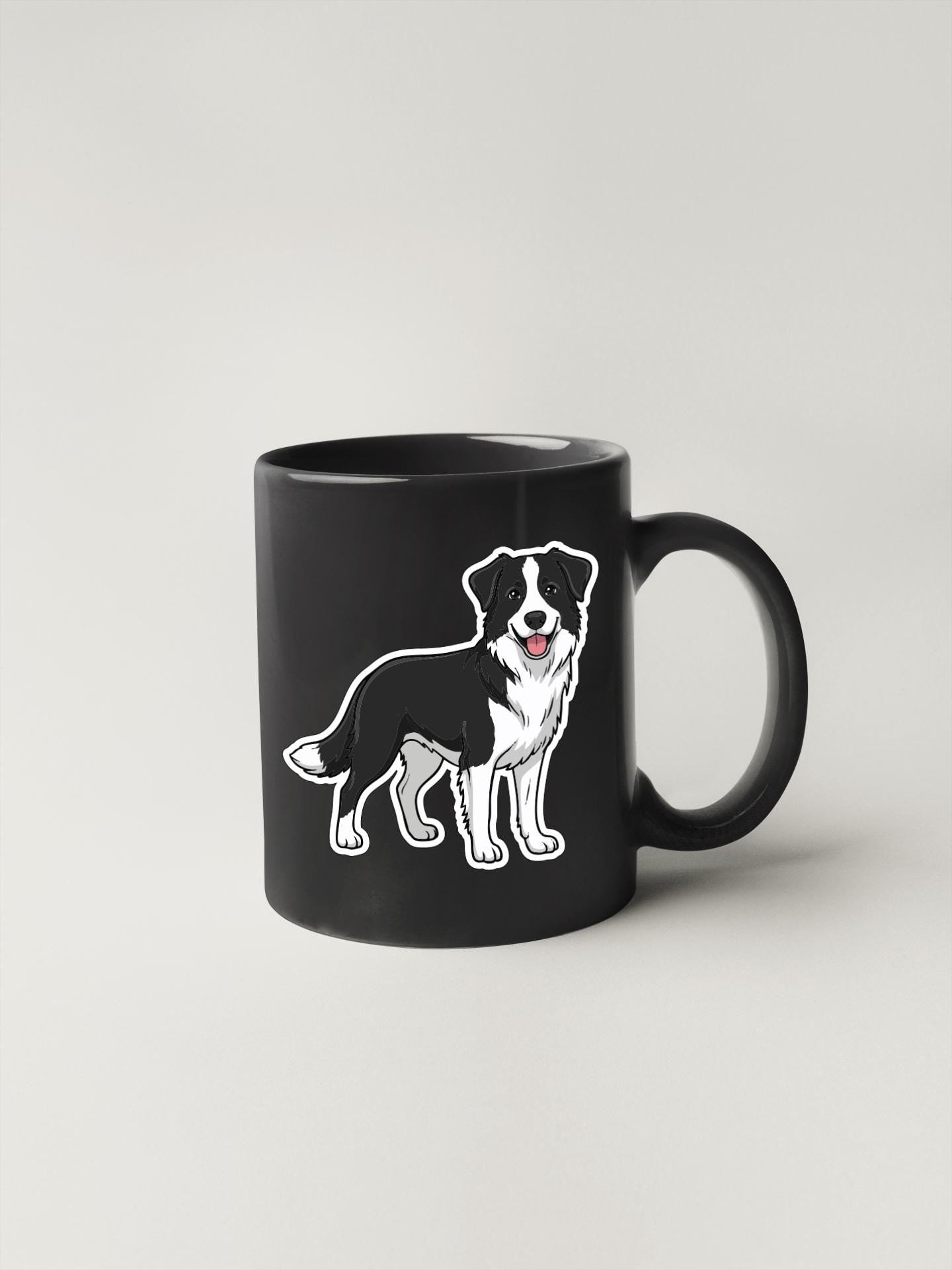 A black coffee mug with a cartoon illustration of a dog on it.
