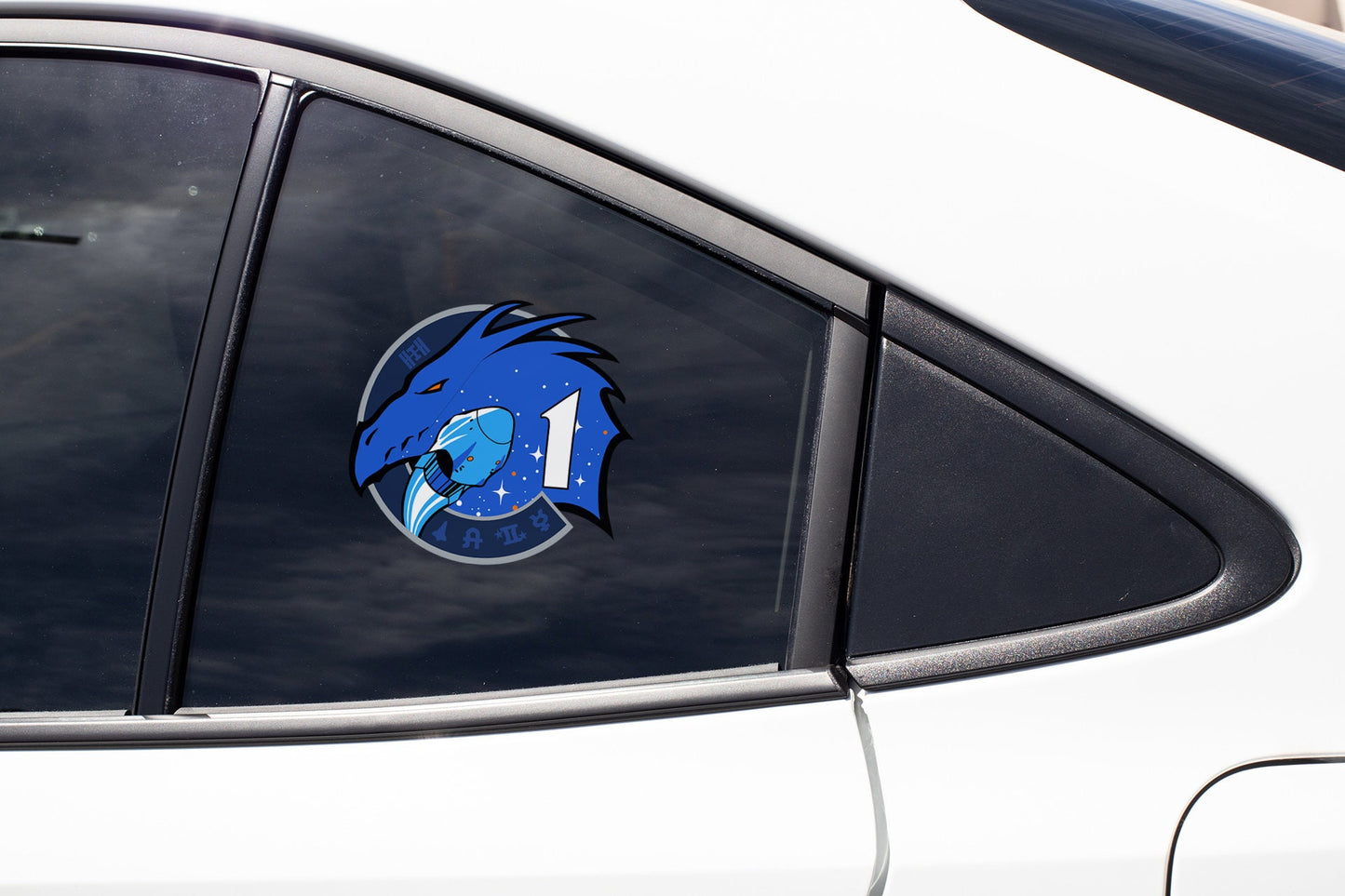 a close up of a car window with a sticker on it