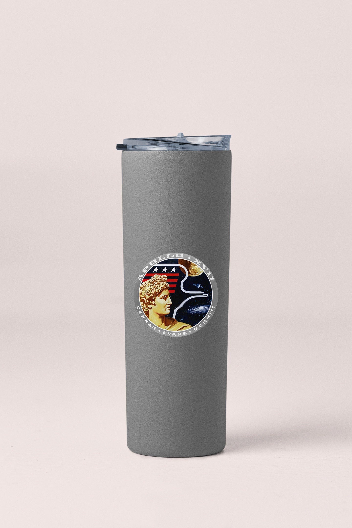 a stainless steel tumbler with a picture of a bird on it