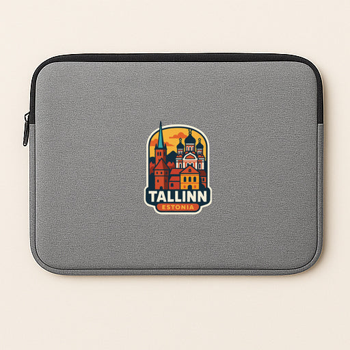 A gray laptop sleeve with a graphic design of Tallinn, Estonia, featuring a stylized illustration of the city's skyline.