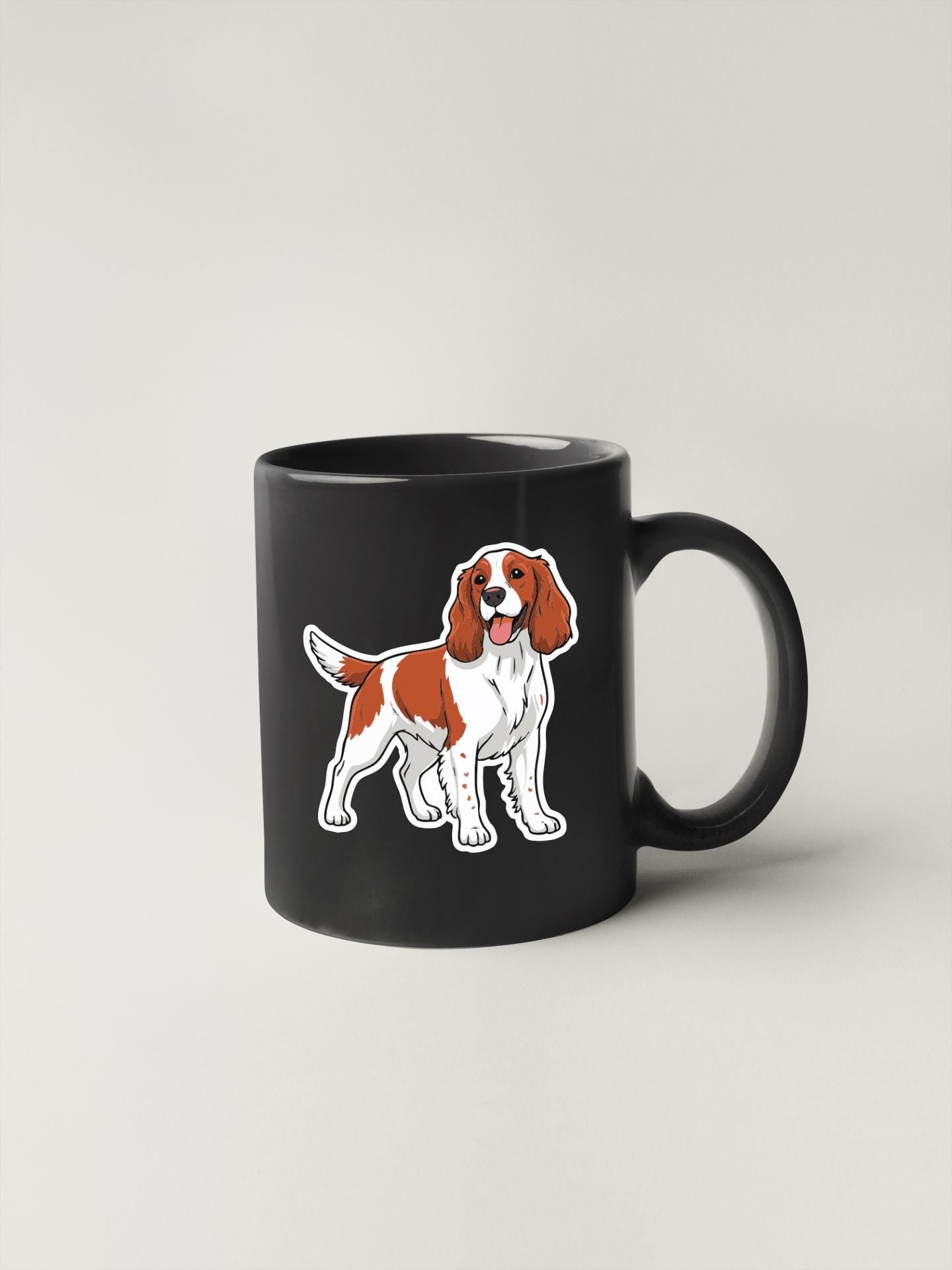 A black mug with a cartoon illustration of a dog on it.
