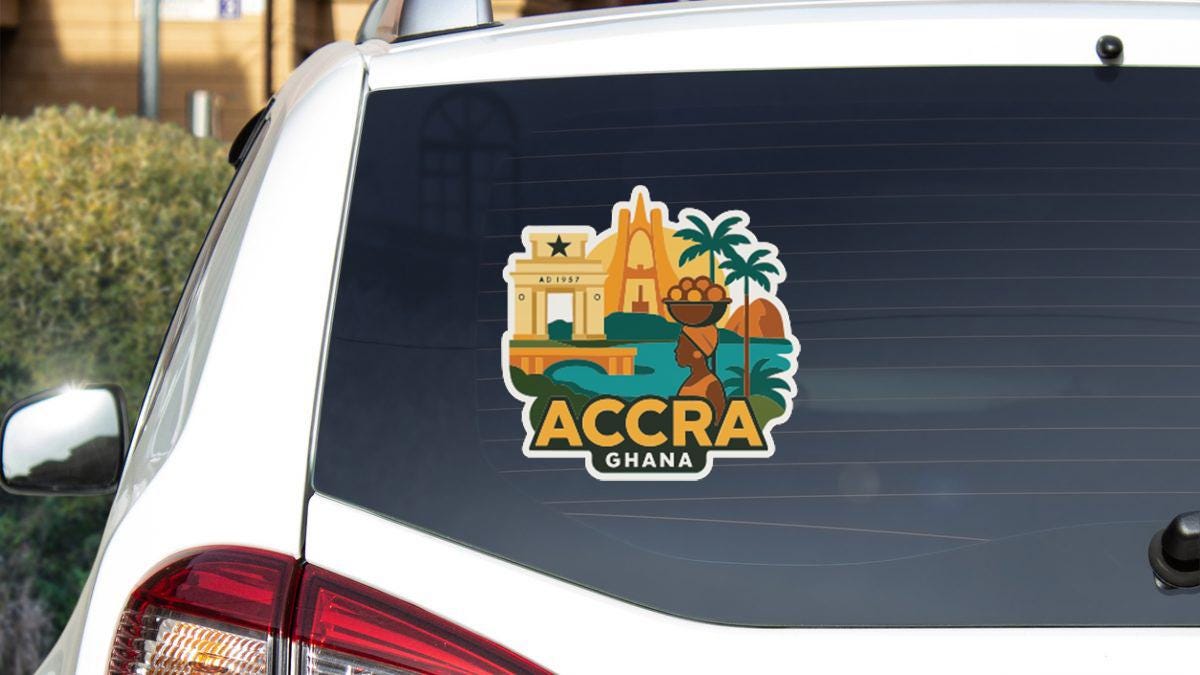 a sticker on the rear window of a white car, depicting a cityscape with a prominent building and palm trees.