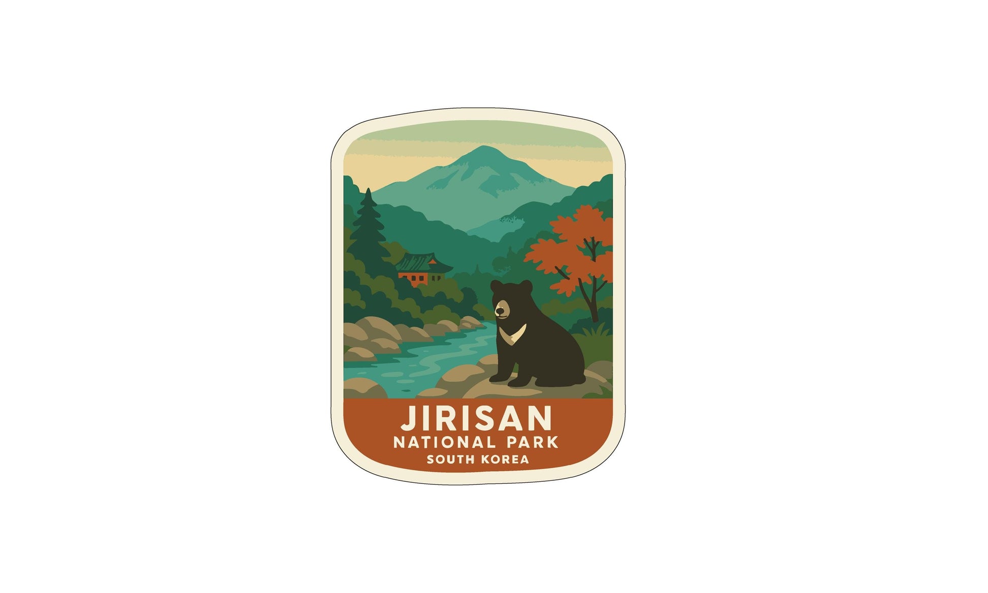 A sticker depicting a bear in a natural setting, with mountains and trees in the background.