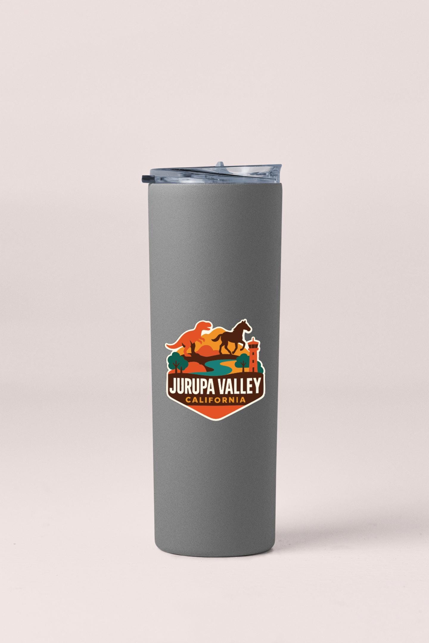 A gray insulated tumbler with a logo for Jurupa Valley, California.