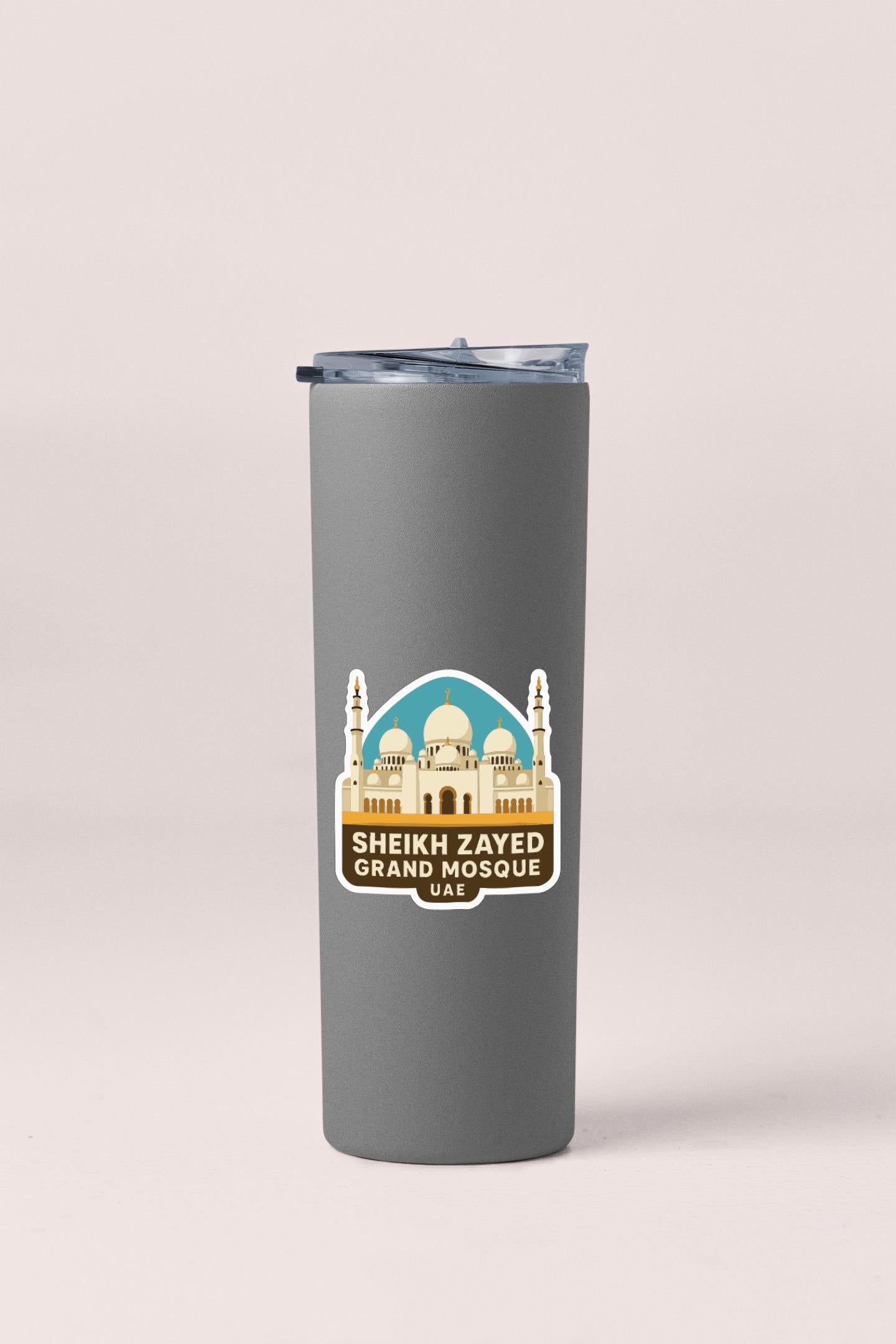 A gray tumbler with a sticker depicting the Sheikh Zayed Grand Mosque in UA.