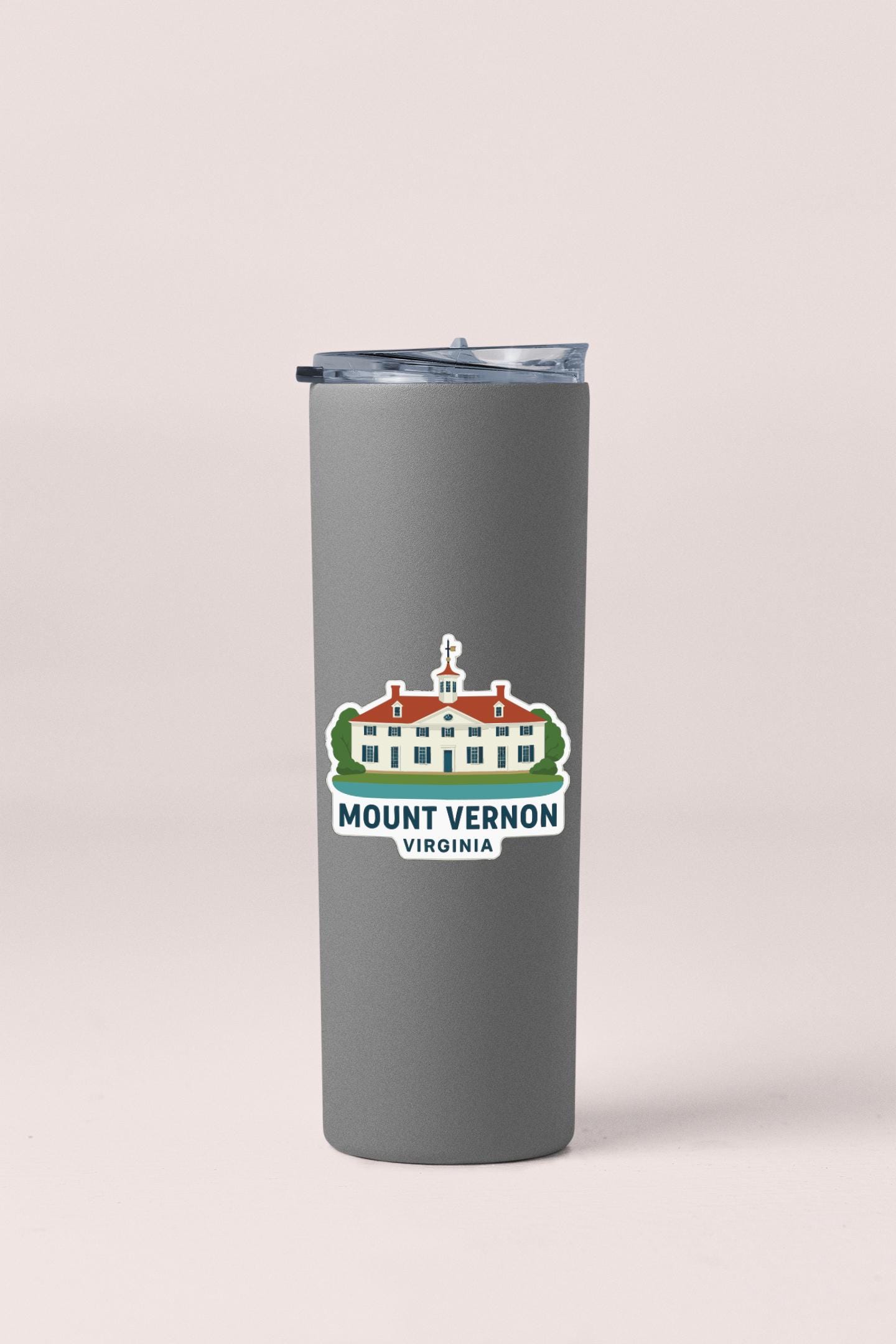 A gray insulated tumbler with a printed logo of Mount Vernon, Virginia, on it.