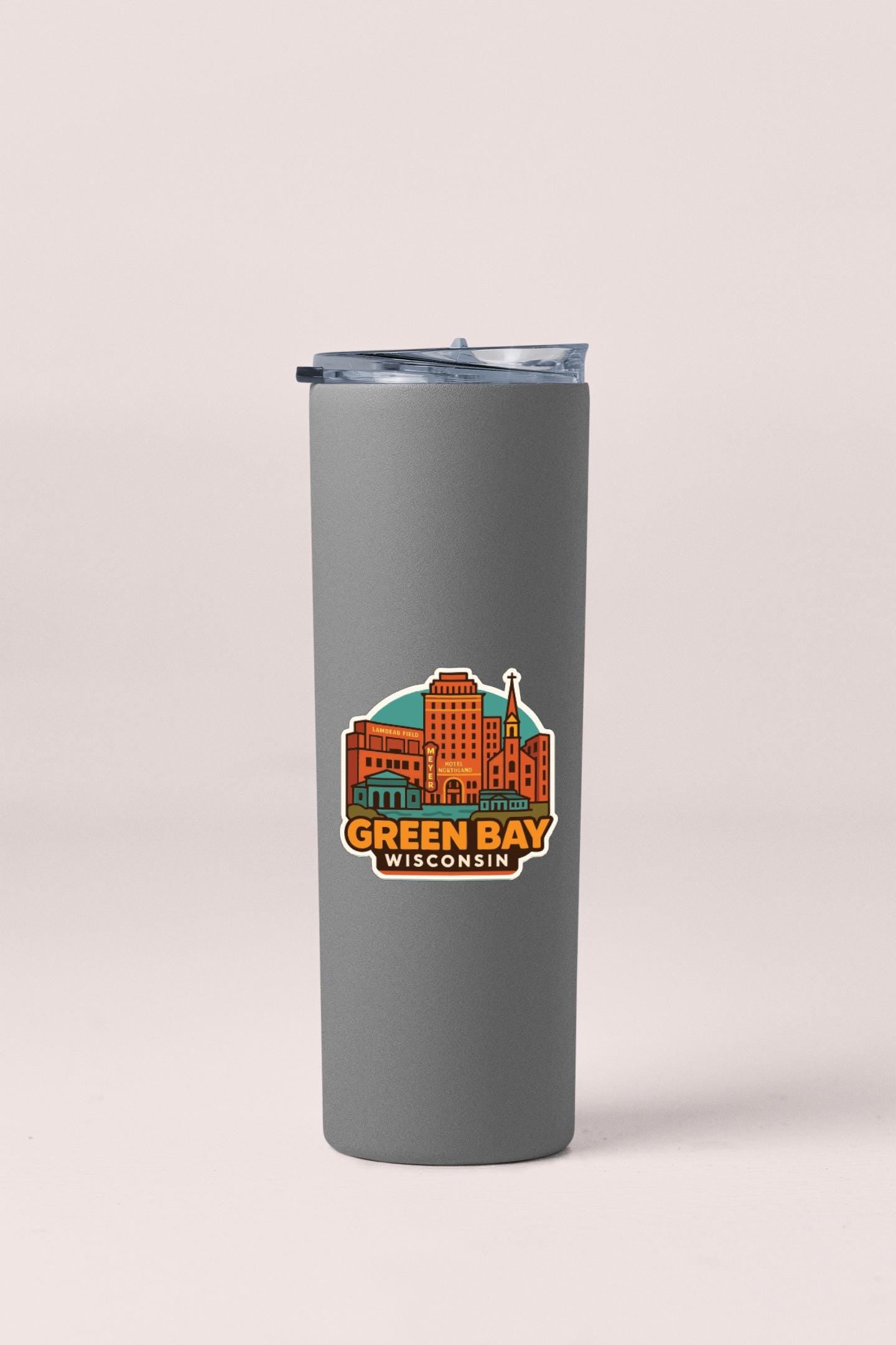 A gray insulated tumbler with a graphic design depicting the cityscape of Green Bay, Wisconsin.