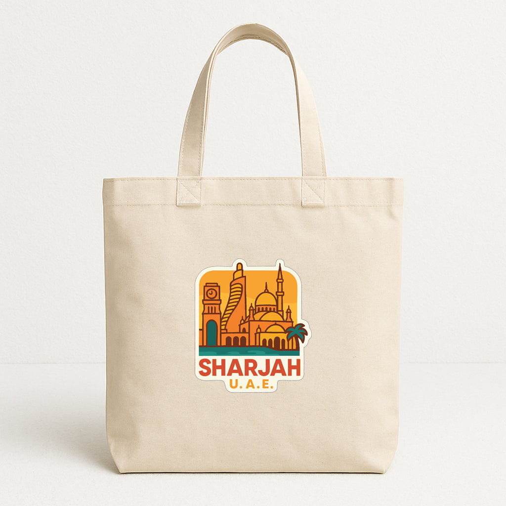 A beige tote bag with a printed design of the skyline of Sharjah, United Arab Emirates.
