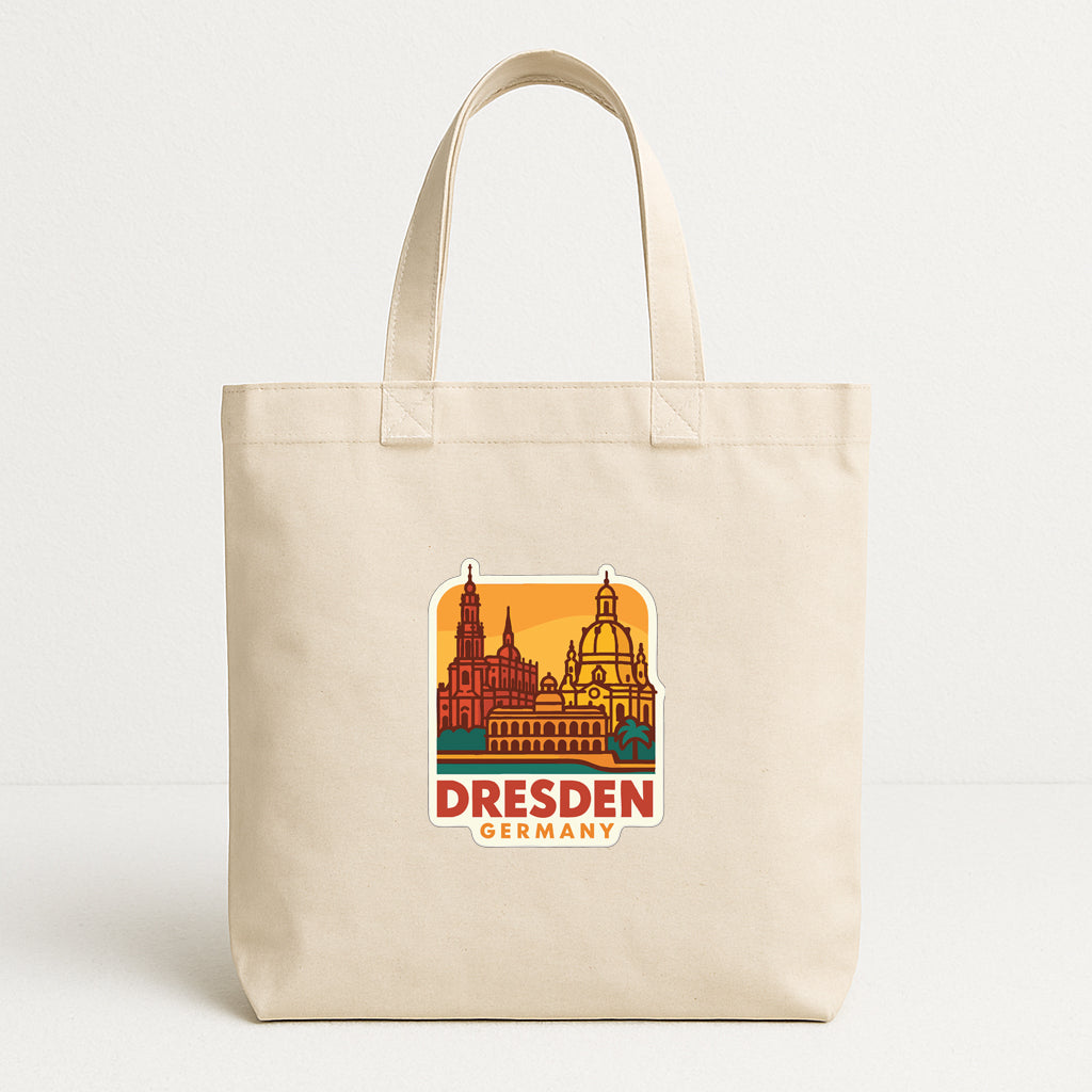 A beige tote bag with a graphic of Dresden, Germany, printed on it.