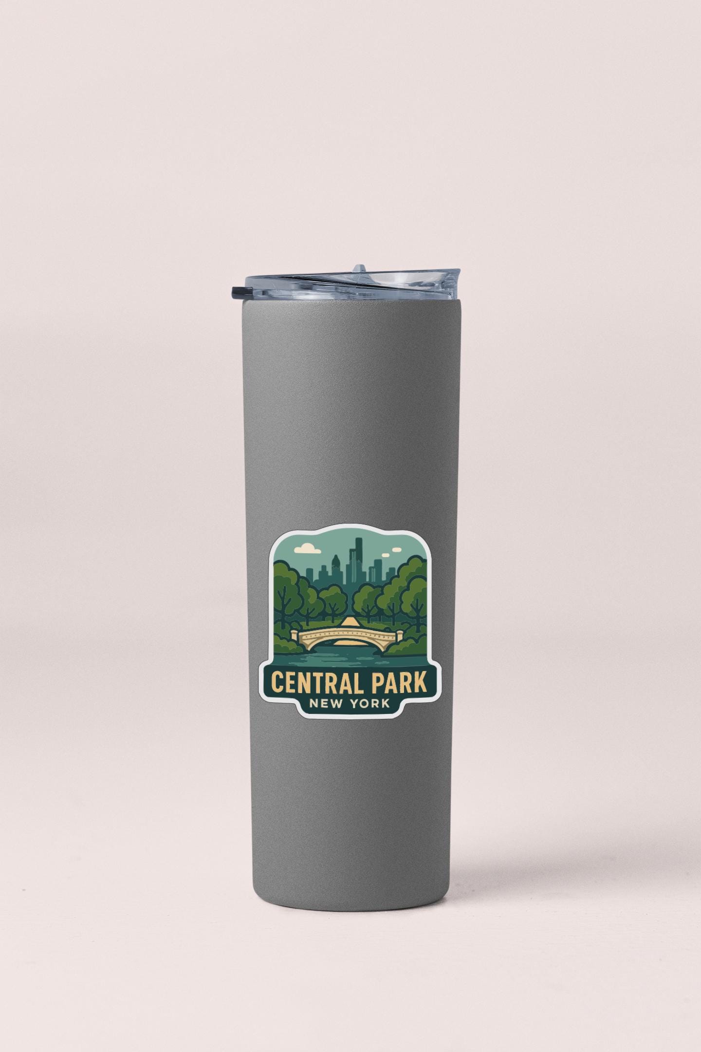 A gray insulated tumbler with a label that says "Central Park New York".
