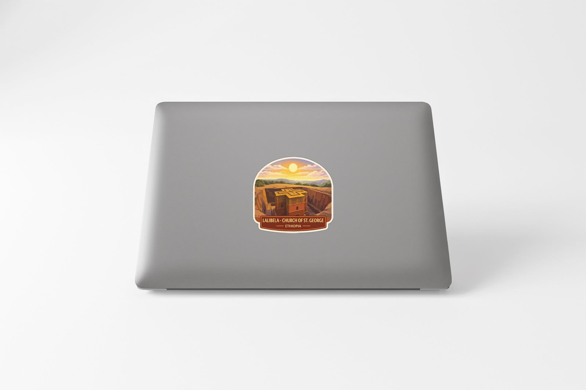 A sticker on the back of a laptop computer.