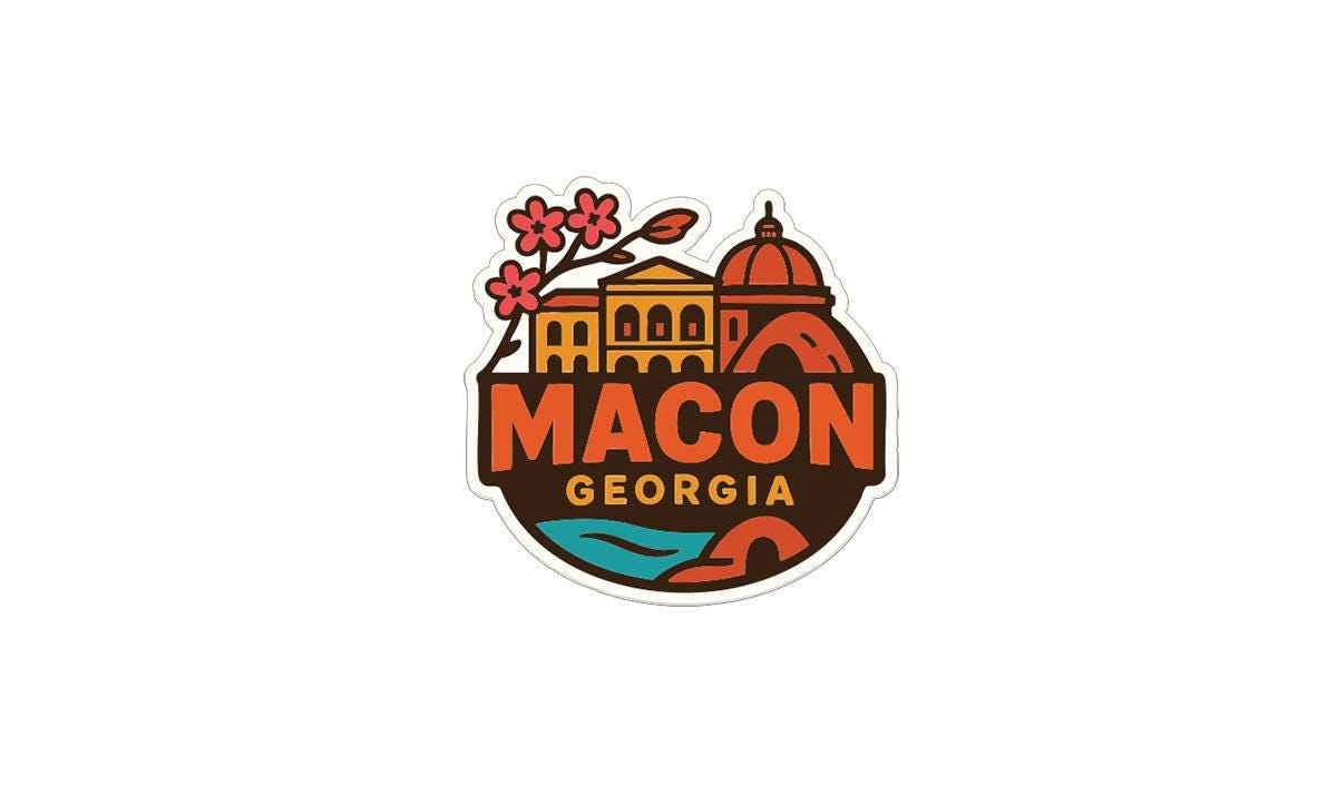 A sticker or logo featuring the city of Macon, Georgia, with a stylized illustration of buildings, flowers, and a dome.