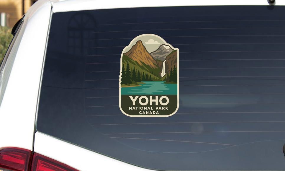 A sticker on the rear window of a vehicle that says "YOFO NATIONAL PARK CANADA".