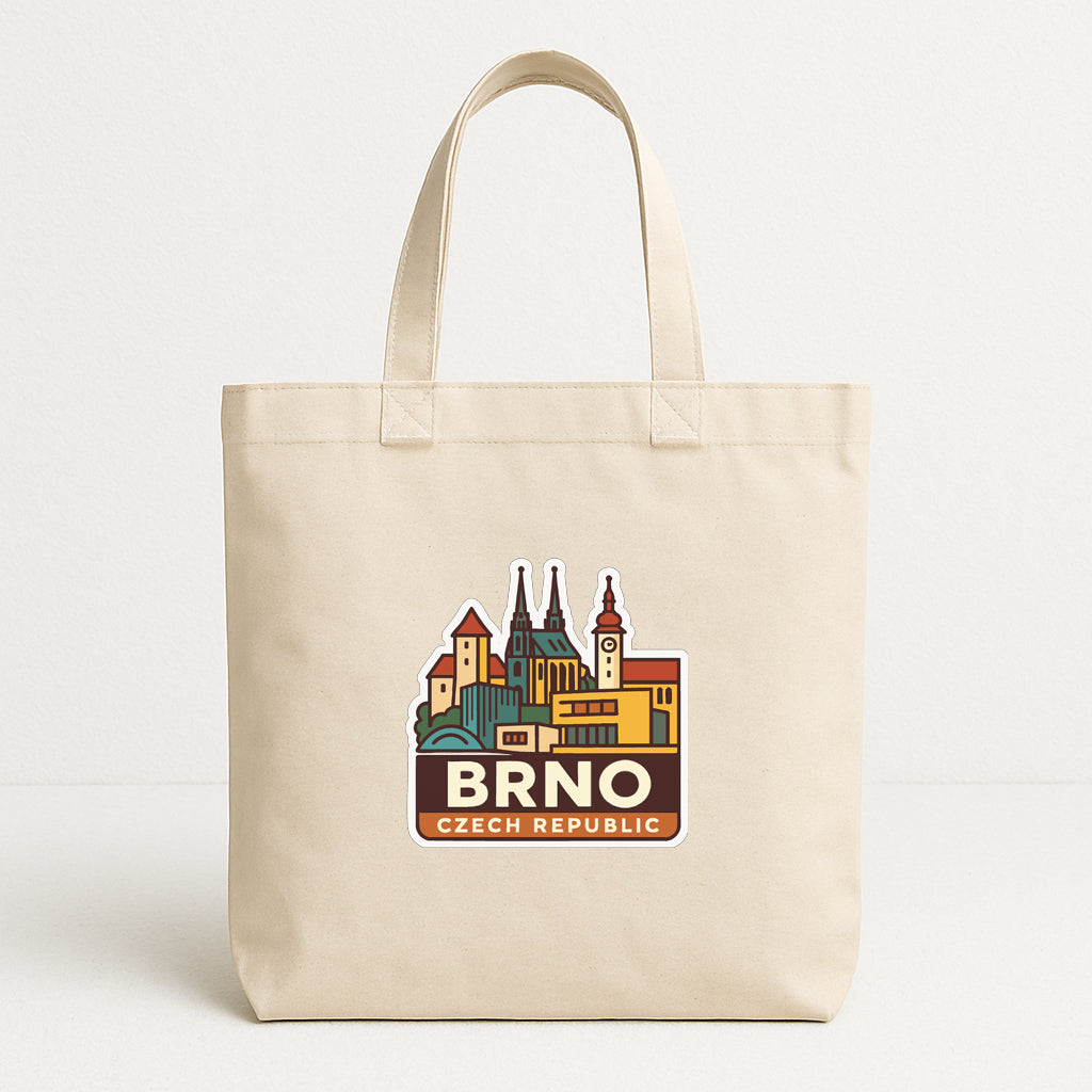 A beige tote bag with a graphic design featuring a cityscape and the text "BRNO Czech Republic".