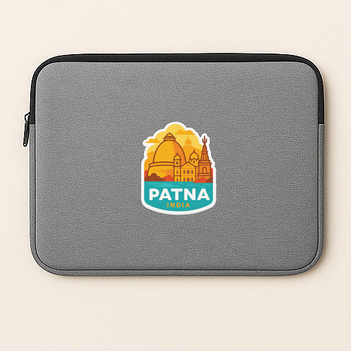 A gray laptop sleeve with a sticker of Patna, India, prominently displayed on it.