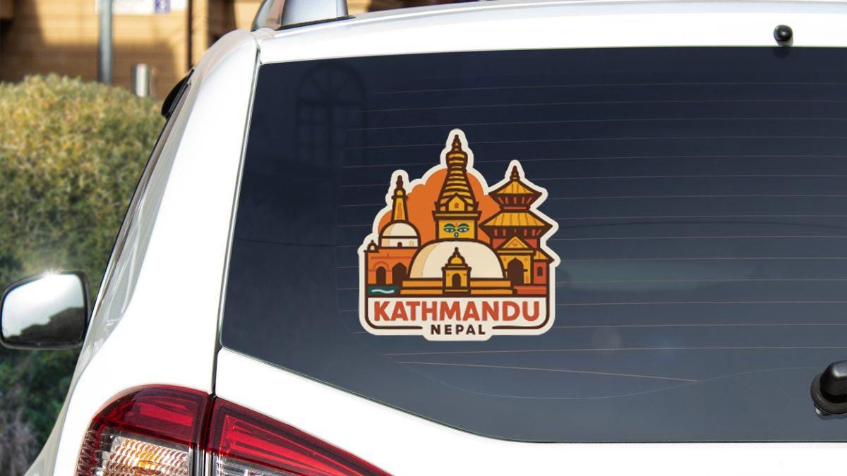 A sticker on the rear window of a car, depicting the iconic Kathmandu temple complex in Nepal.