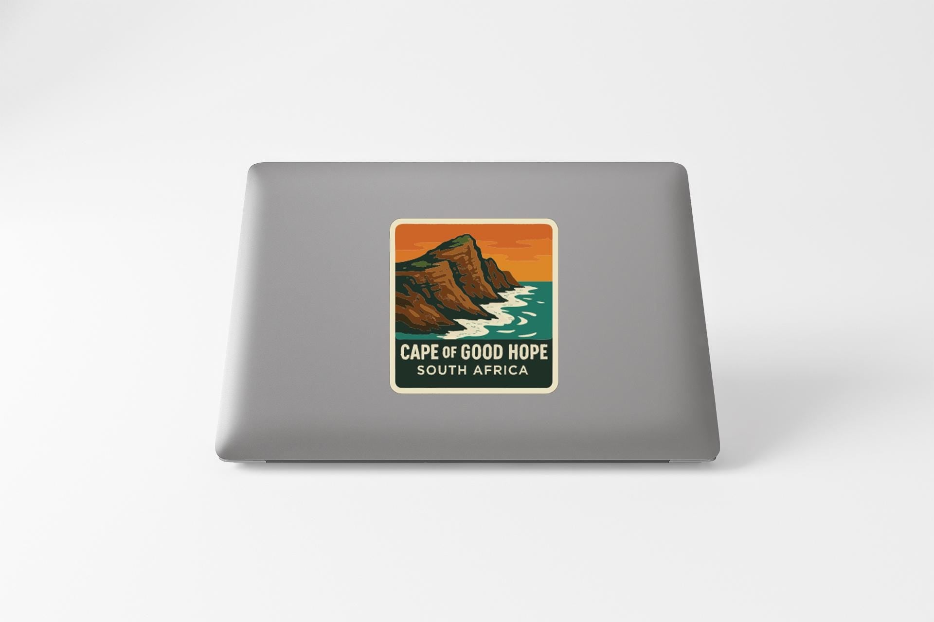 a sticker with a mountain landscape and ocean, depicting the Cape of Good Hope in South Africa.