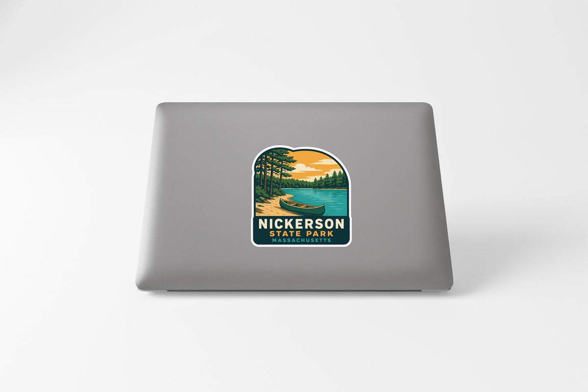 A sticker on the back of a laptop that features a scenic landscape with a lake, trees, and a boat, along with the text "NICKERSON STATE PARK".