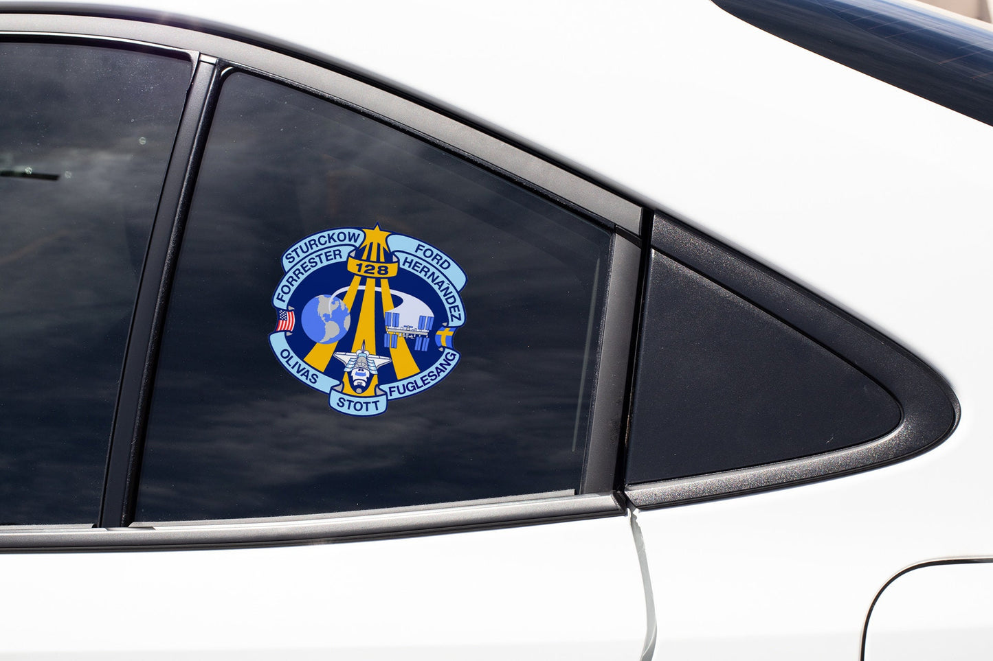 a close up of a car window with a sticker on it
