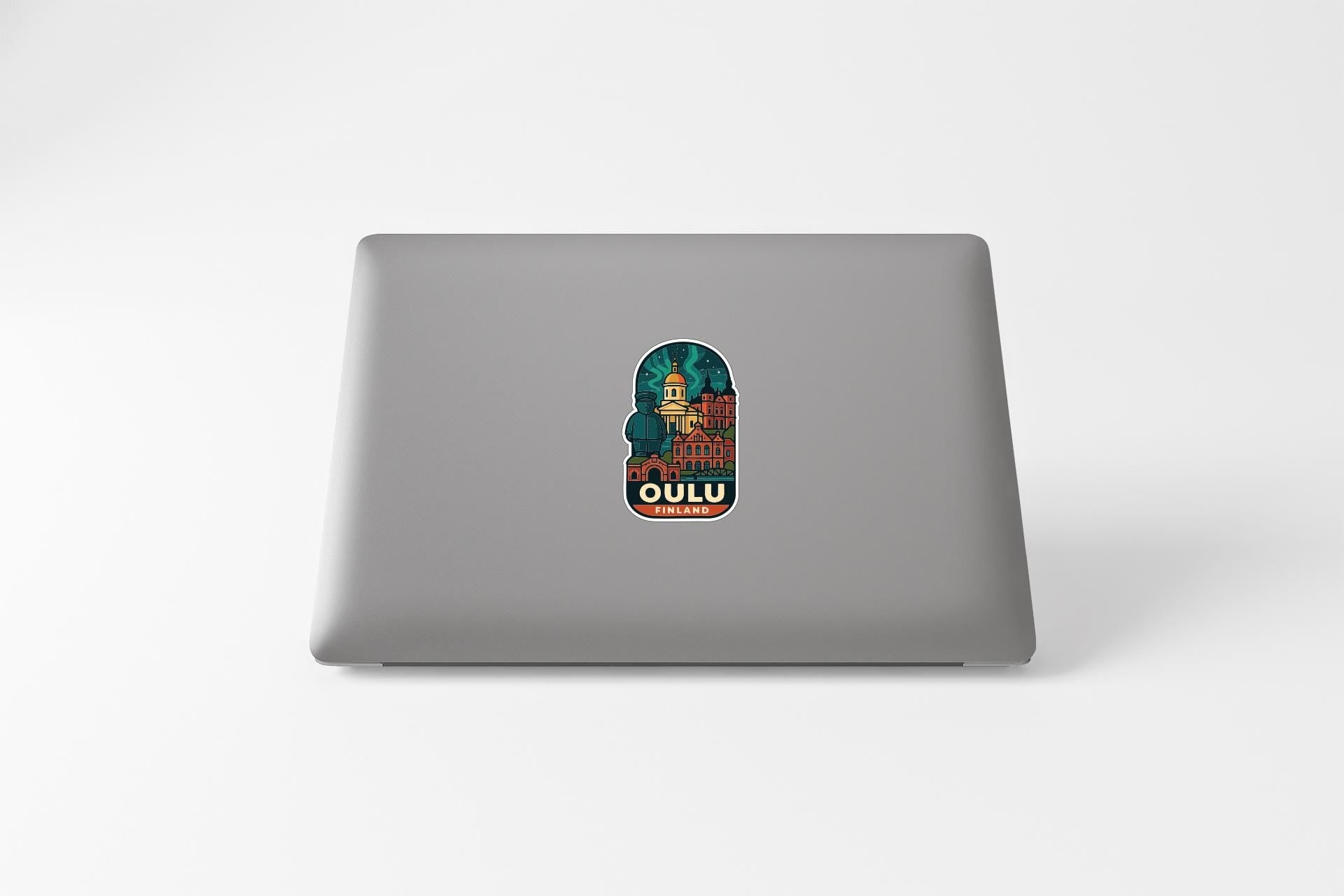 a laptop with a sticker of a man on it