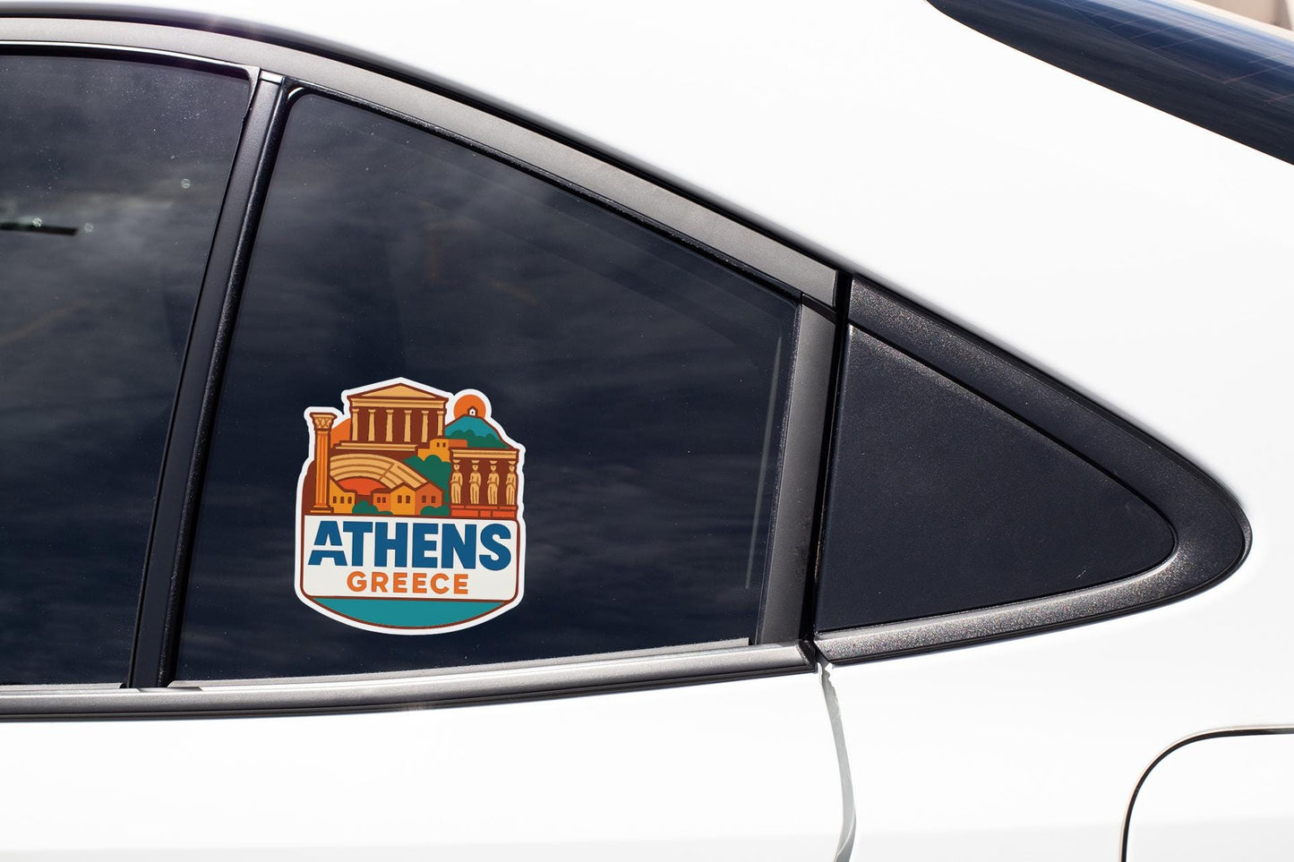 A sticker on the side of a car window that says "Athens Greece".