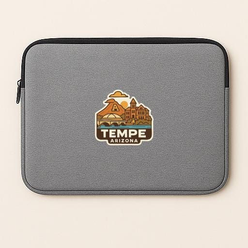 A gray laptop sleeve with a graphic design featuring a cityscape and the text "TEMPE ARIZONA" printed on it.