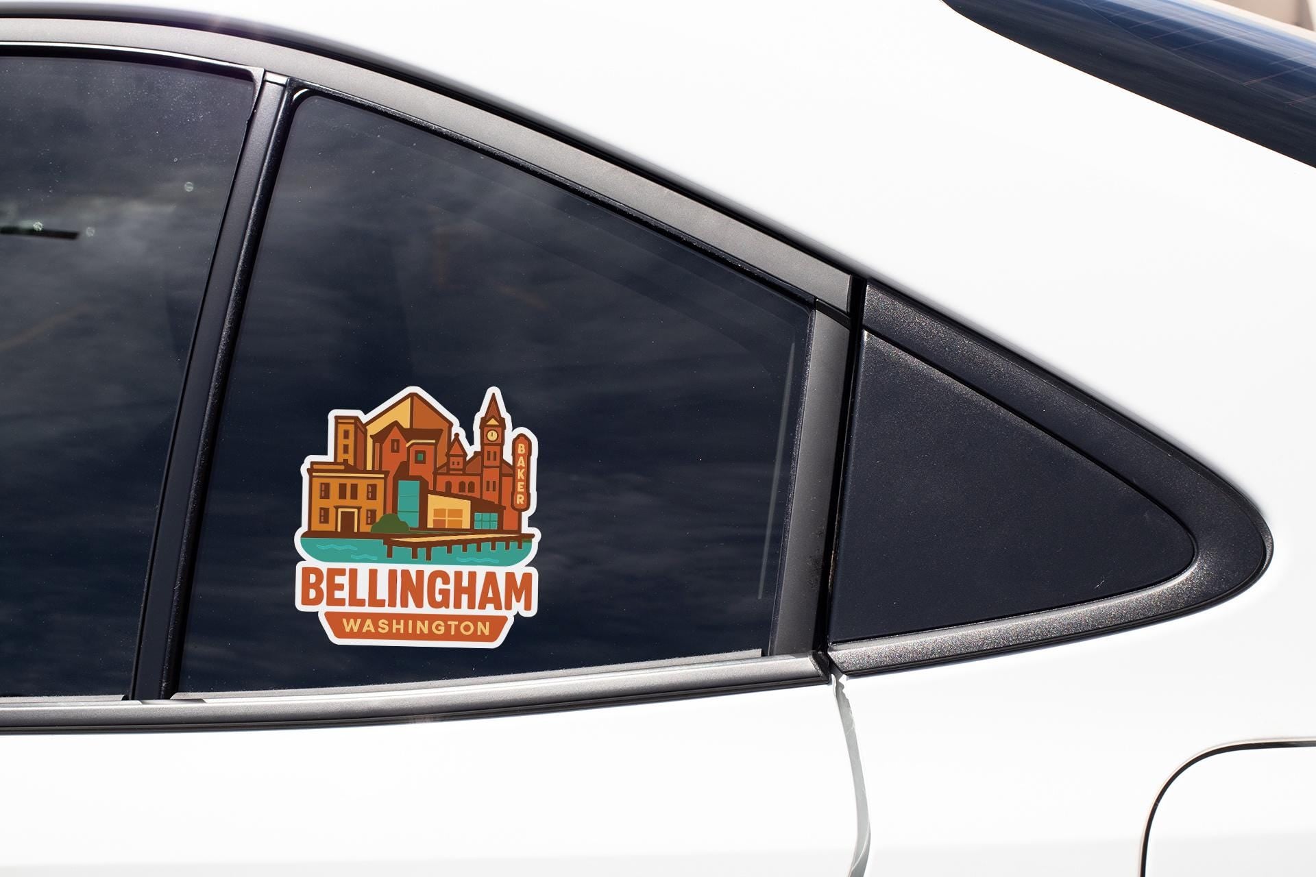 A sticker on the side of a car window, depicting a cityscape with the text "Bellingham Washington".
