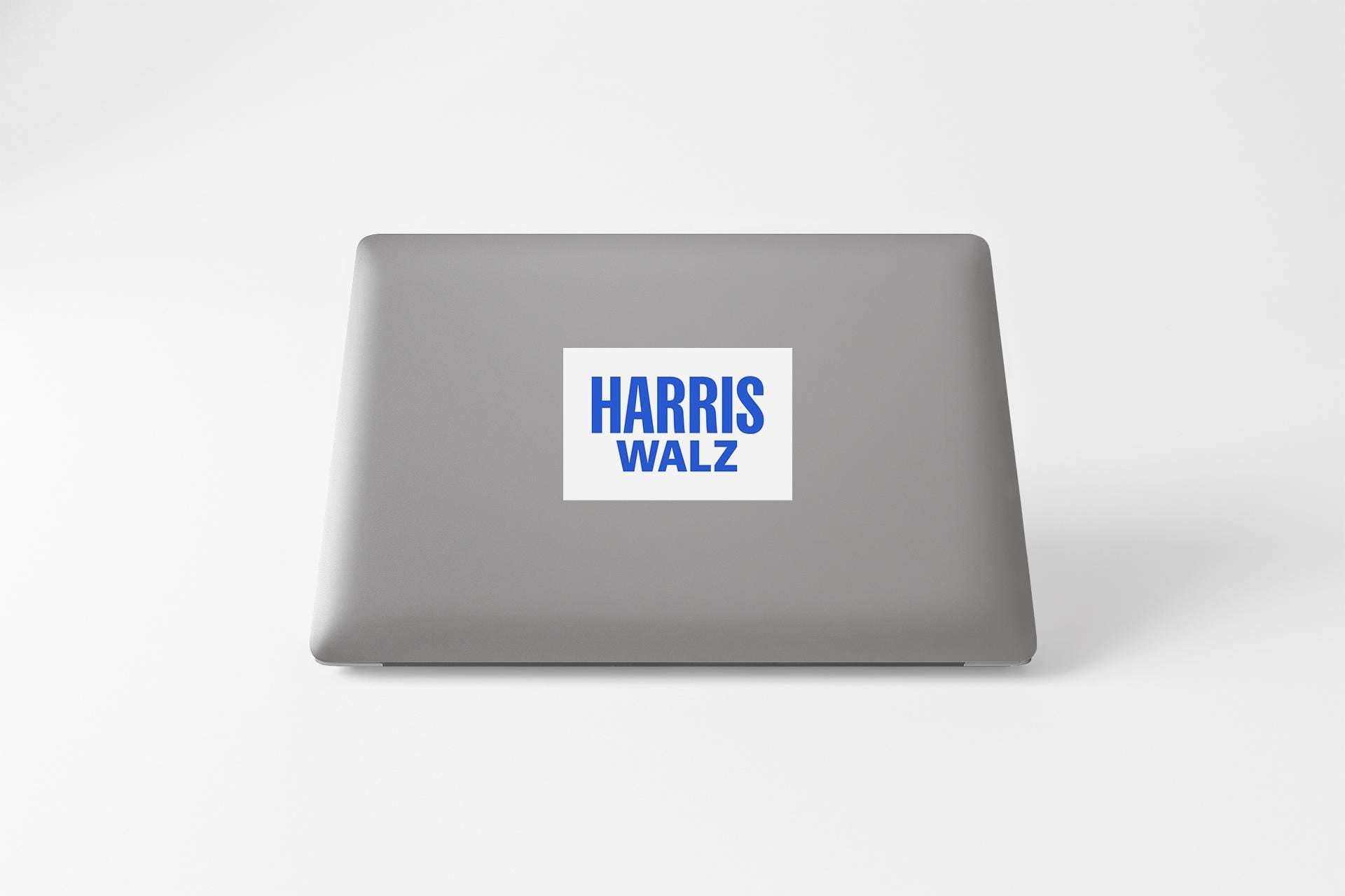 a laptop computer sitting on top of a white table