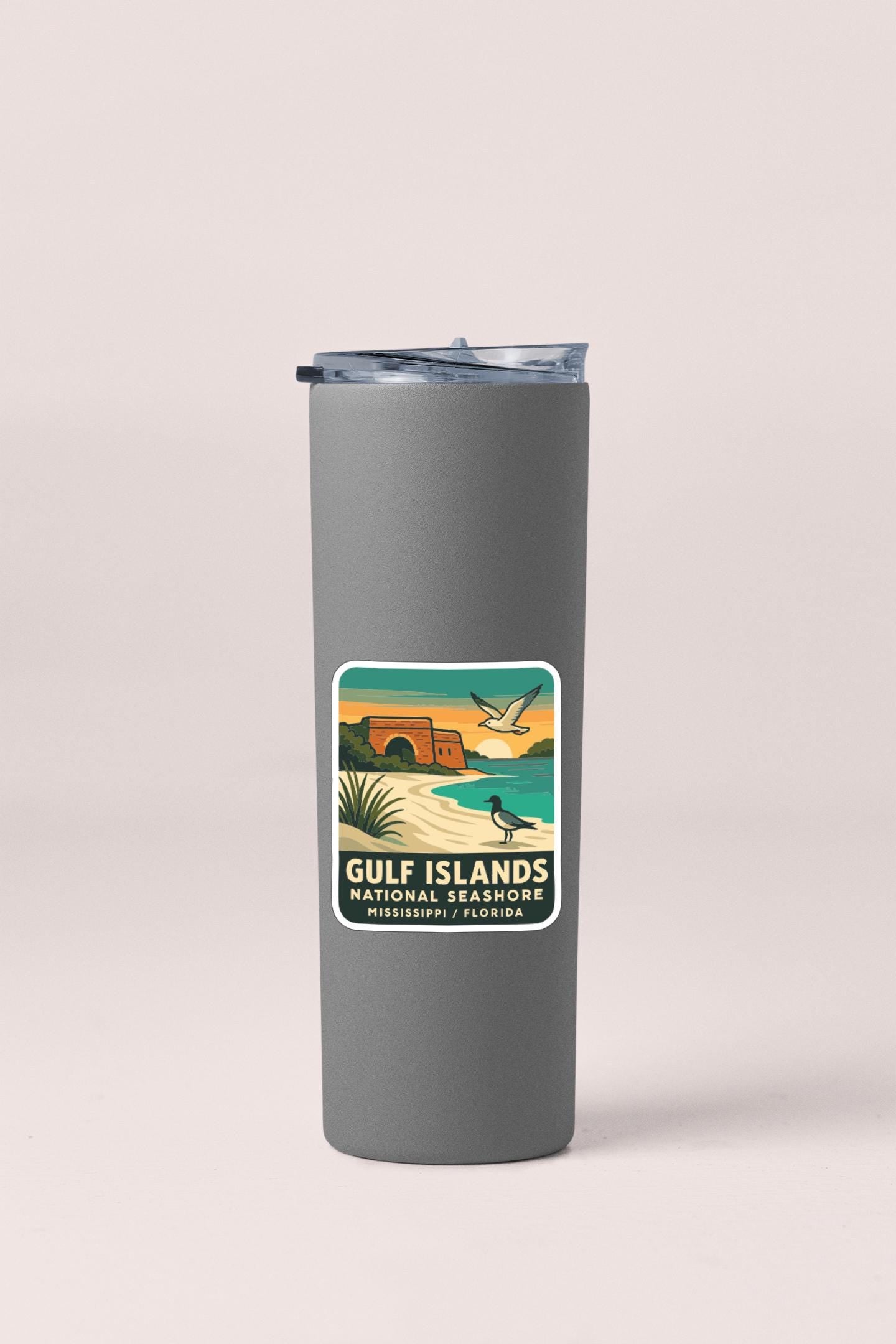 A gray insulated tumbler with a label that says "Gulf Islands National Seashore, Mississippi, Florida".