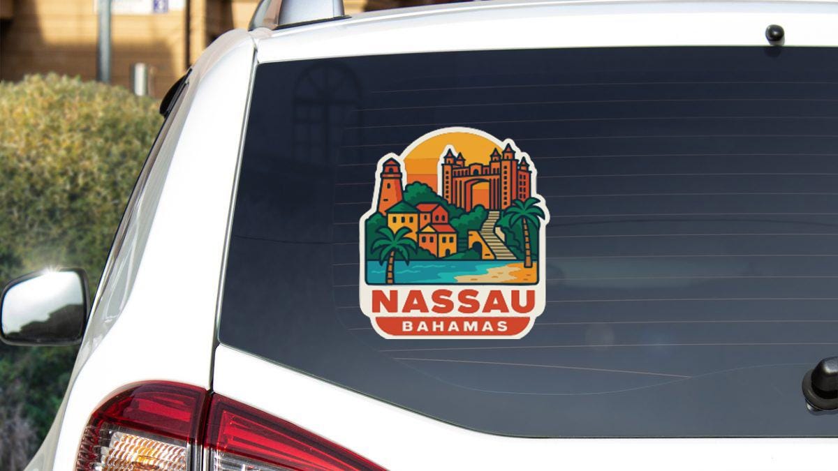 A sticker on the rear window of a car that features a tropical island landscape with a lighthouse and palm trees.