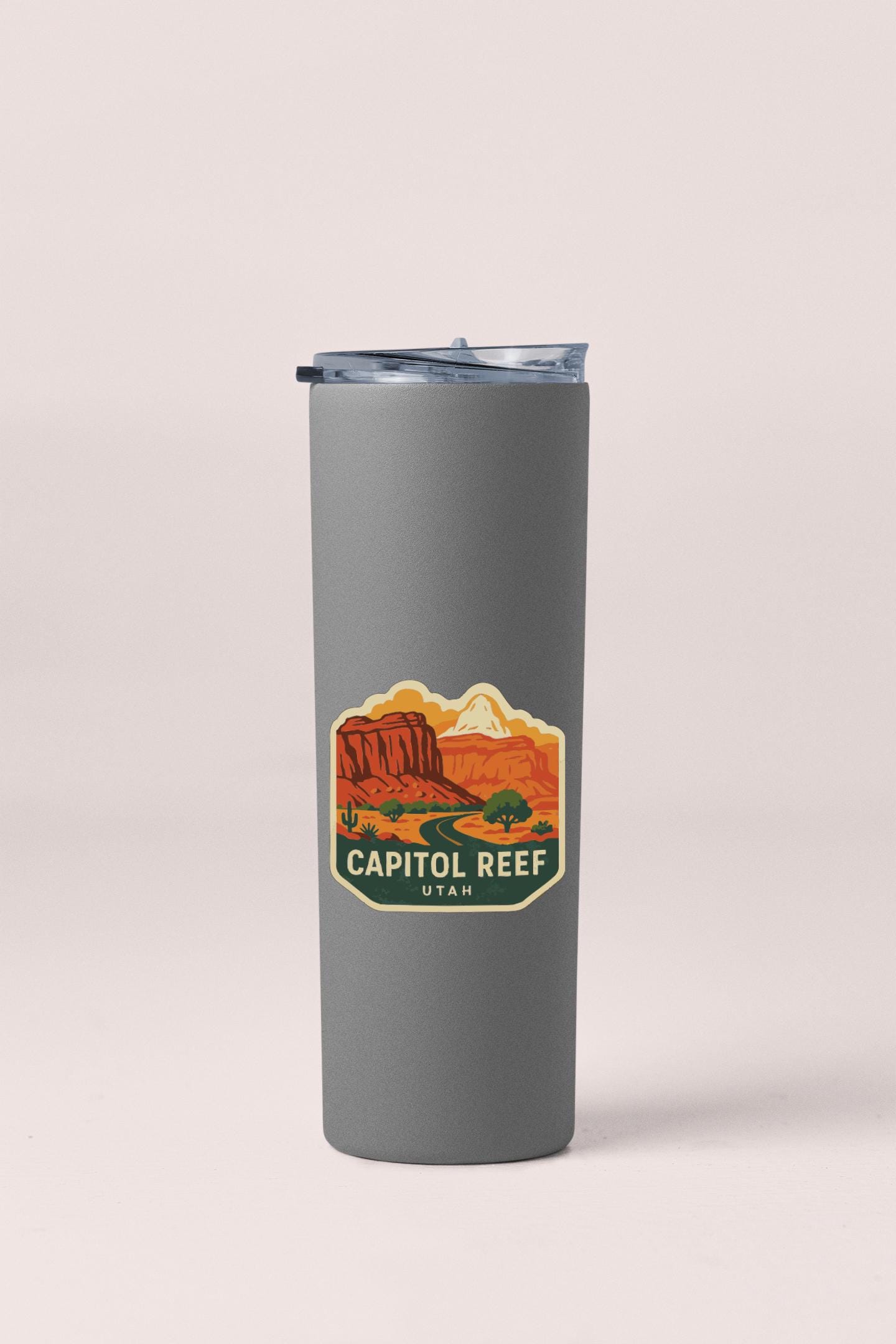 A gray insulated tumbler with a label that says "CAPITOL REEF, UTAH".