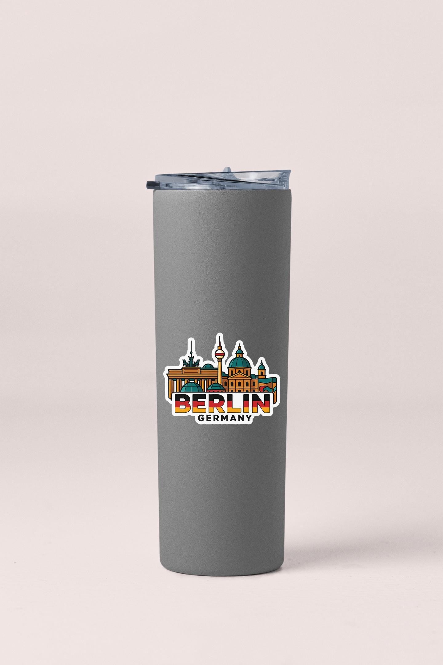 a stainless steel travel mug with berlin germany on it