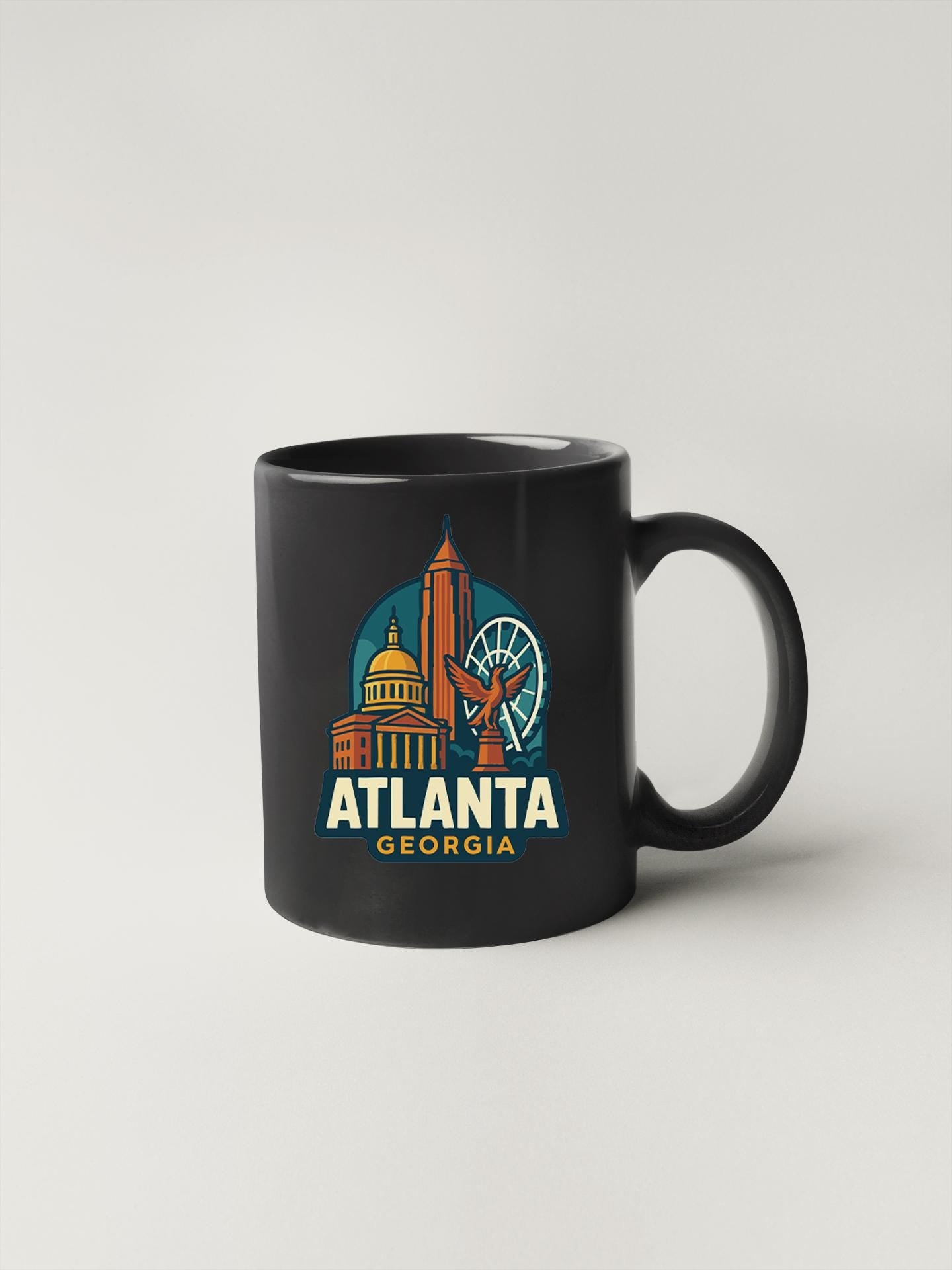a black coffee mug with the words atlanta on it