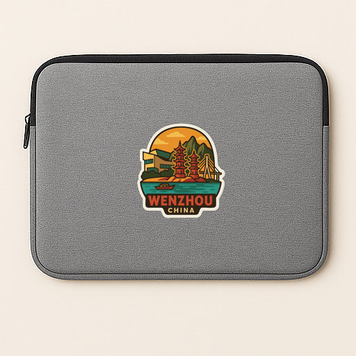 A gray laptop sleeve with a sticker depicting a scenic view of Wenzhou, China.