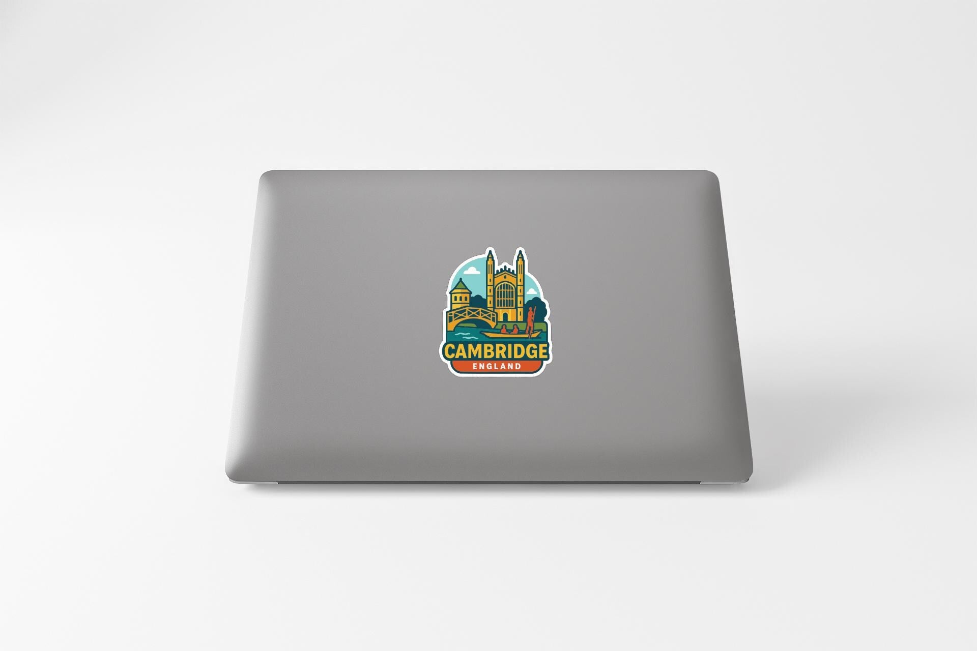 A sticker depicting a landmark, likely a famous building or monument, with the text "Cambridge England" printed on it.