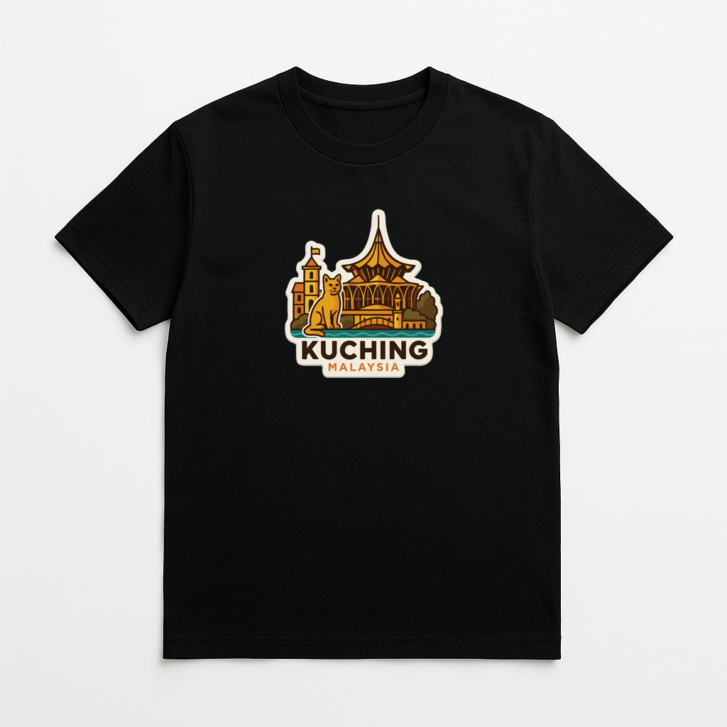 A black t-shirt with a graphic design depicting a landmark, specifically the Kuching skyline, and the text "Kuching Malaysia" printed on it.