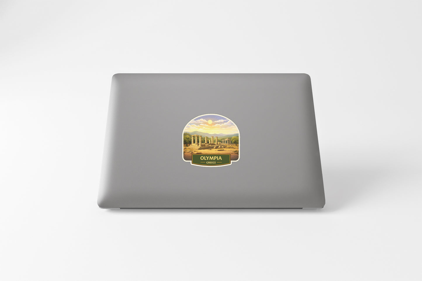 a sticker with a scenic landscape on a laptop.