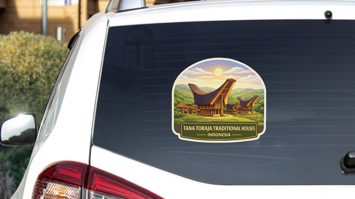 a sticker on the rear window of a car, depicting traditional houses in Indonesia.