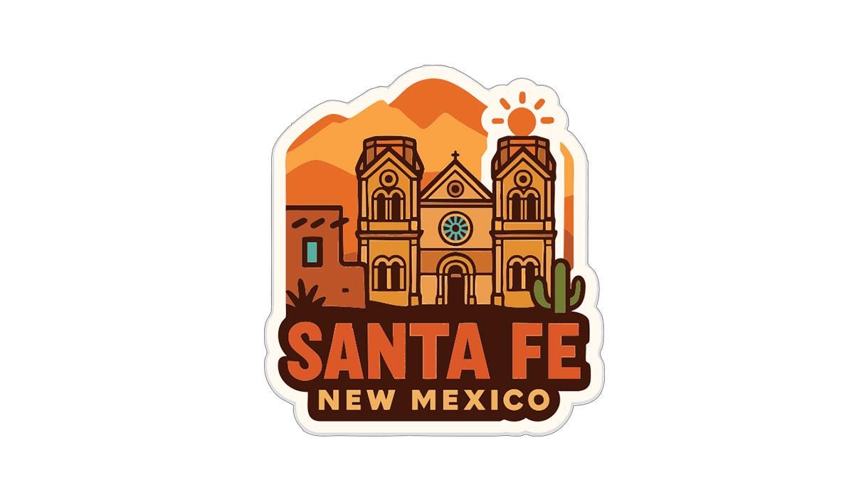 A sticker or illustration depicting the Santa Fe Cathedral in New Mexico, with mountains in the background and a desert landscape.