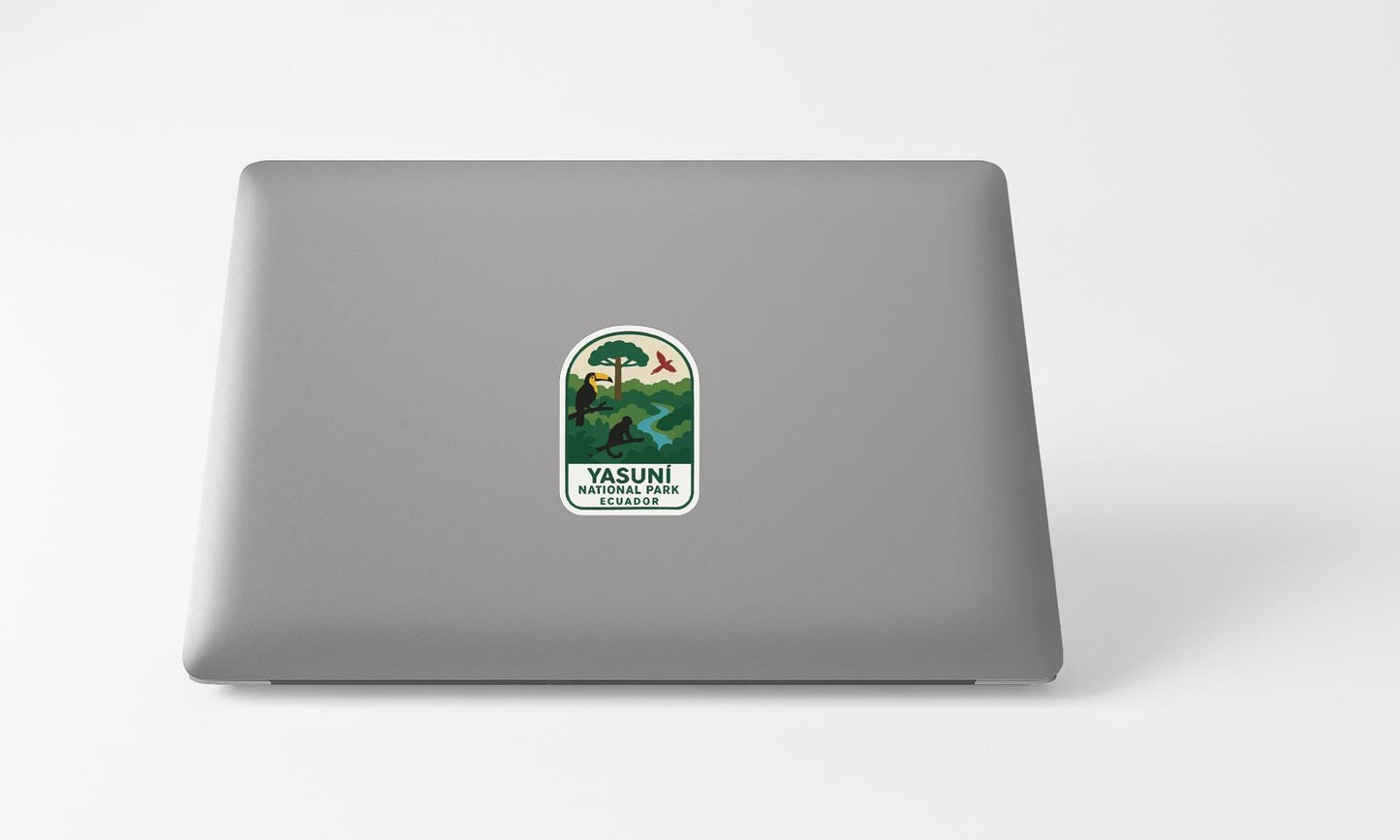 a sticker with a landscape and a river on a laptop.