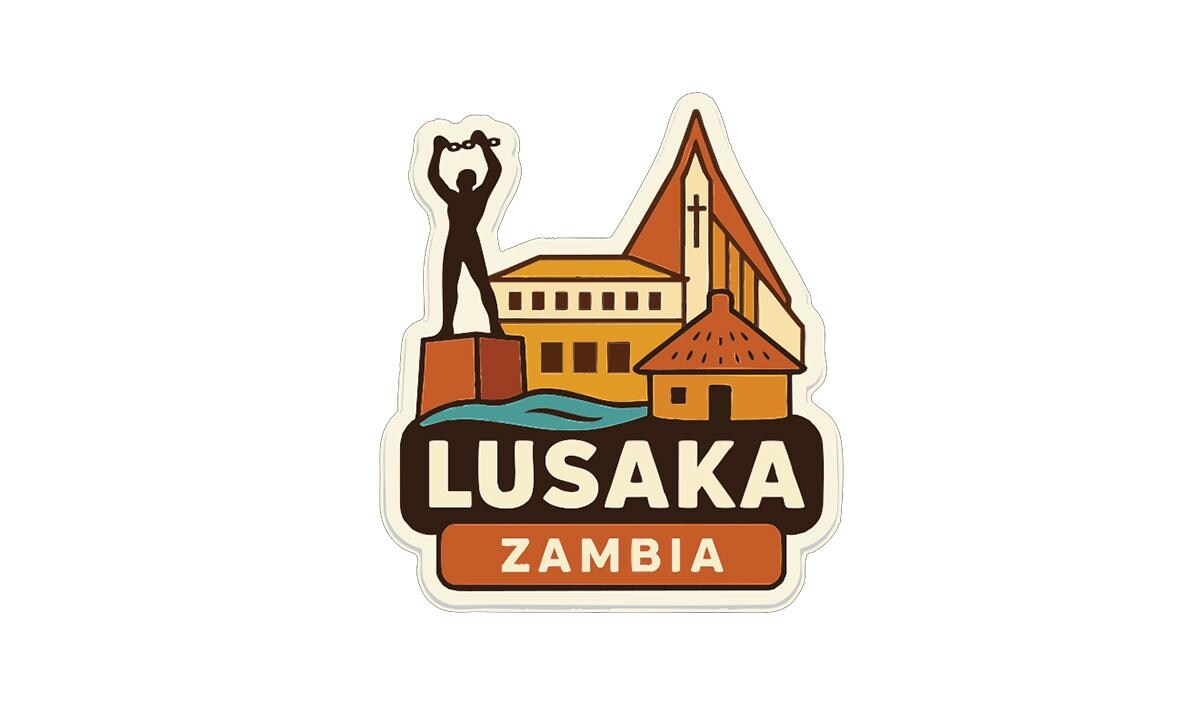 a sticker or logo with a stylized illustration of a person standing on a building, surrounded by various architectural elements such as a church, a house, and a tower. The text "LUSAKA ZAMBIA" is prominently displayed below the illustration.