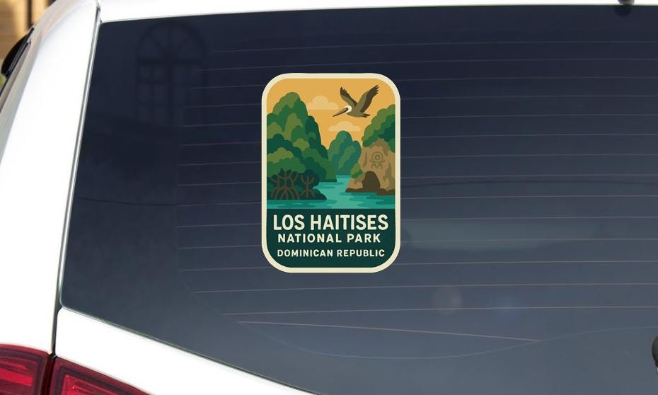A sticker on the rear window of a car that says "LOS HAITISES NATIONAL PARK DOMINICAN REPUBLIC".