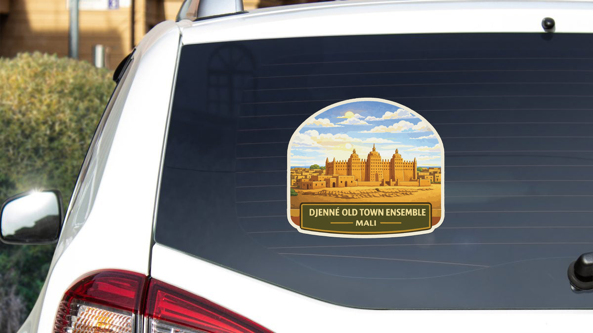 a sticker on the rear window of a car, depicting a cityscape with a castle-like structure in the background.