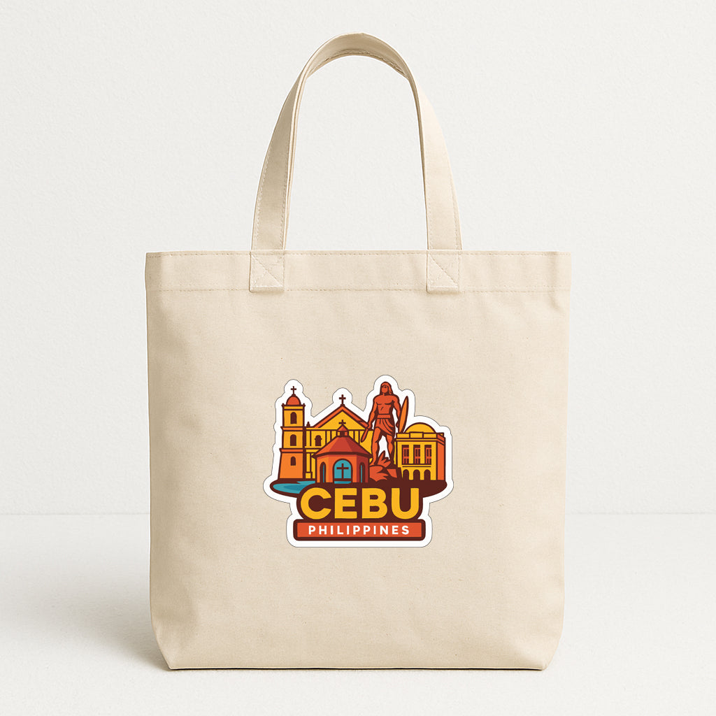 A beige tote bag with a colorful graphic of Cebu, the capital city of the Philippines, printed on it.