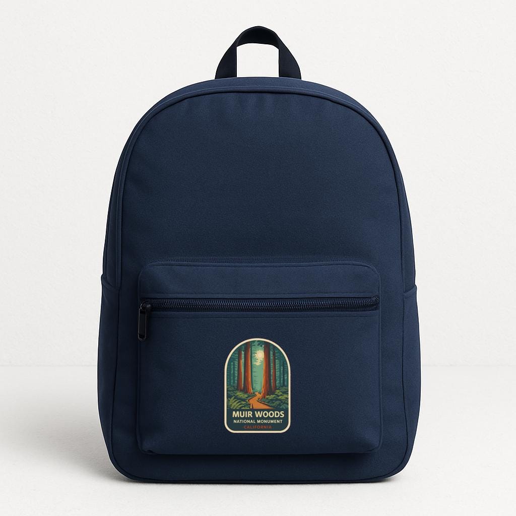 A navy blue backpack with a logo on the front pocket.
