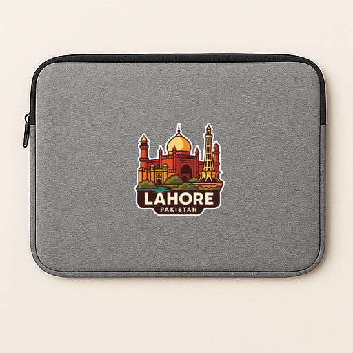 A gray laptop sleeve with a sticker of the skyline of Lahore, Pakistan.