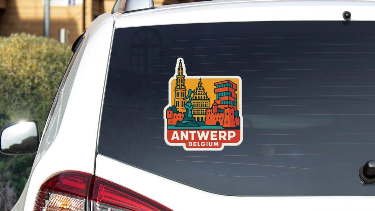 A sticker on the rear window of a car, depicting the cityscape of Antwerp, Belgium.