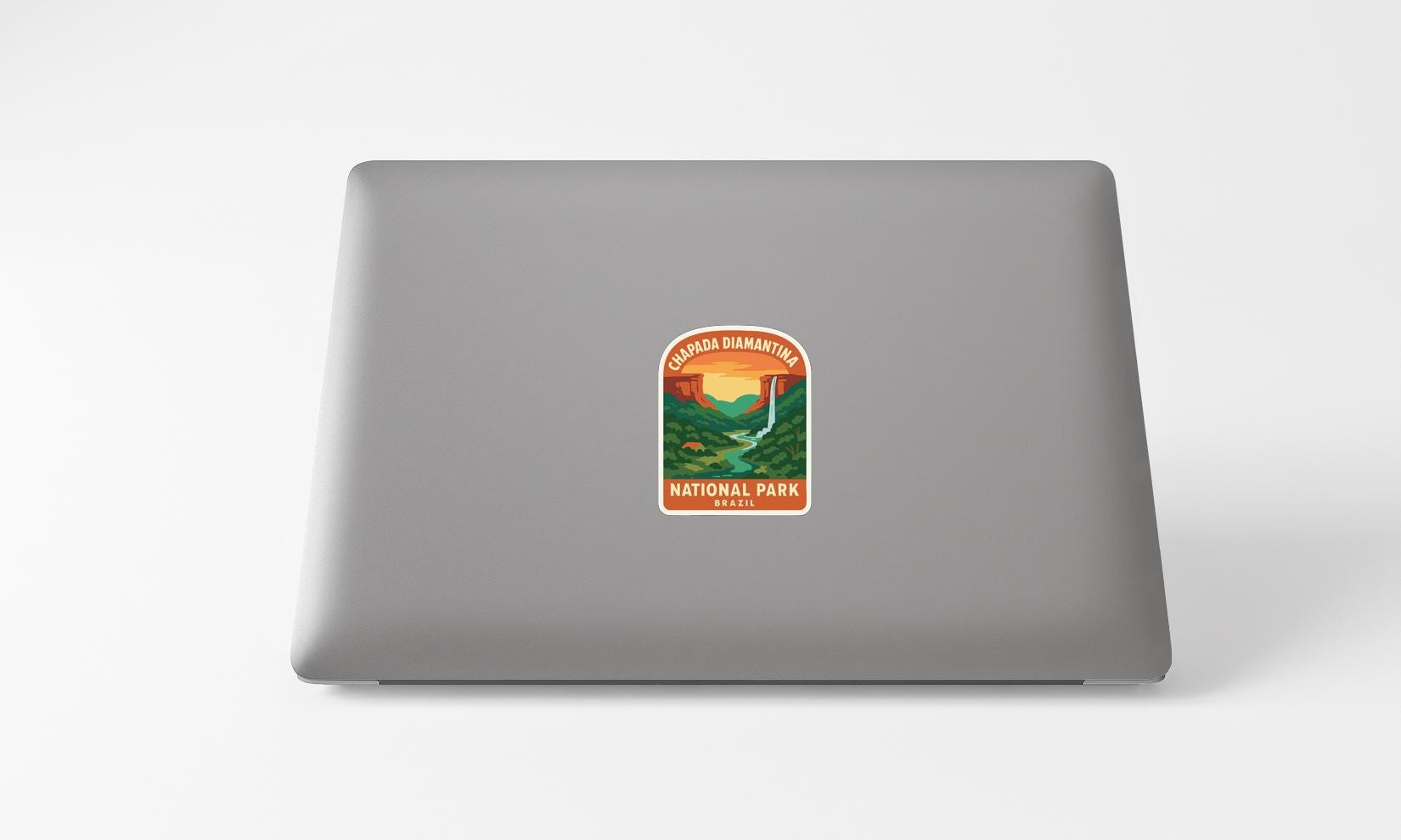 A sticker of the Grand Canyon National Park on the back of a laptop computer.